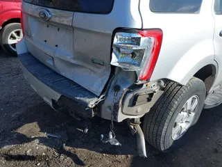 2011 Ford Escape Limited with VIN 1FMCU0EG0BKB94569, listed as a IAAI auction lot 41466649 with 86,748 mi miles. Bid and sale history available at carsss.com. Image 6.