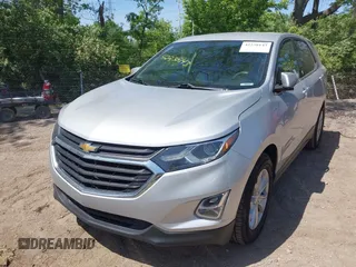 2018 Chevrolet Equinox LT z VIN 2GNAXJEV5J6309683, wystawiony jako IAAI lot #42238143 z przebiegiem 77 164 mil mil oraz . Historia ofert i sprzedaży dostępna na DreamBid. Obrazek 2.