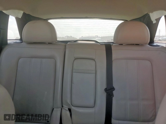 2012 Chevrolet Captiva Sport LTZ z VIN 3GNFL4E51CS522752, wystawiony jako Copart lot #57215795 z przebiegiem 123 522 mil mil oraz Szkoda całkowita • Salvage title. Historia ofert i sprzedaży dostępna na DreamBid. Obrazek 10.