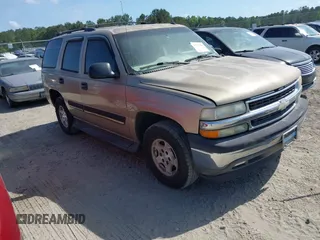2005 Chevrolet Tahoe LS with VIN 1GNEC13V65J249079, listed as a IAAI auction lot 42127866 with 243,705 mi miles. Bid and sale history available at carsss.com. Image 1.