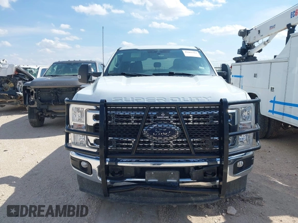 2023 Ford F-250 XL with VIN 1FT7W2BT2PEC64642, listed as a IAAI auction lot 42661561 with 22,936 mi miles and . Bid and sale history available at DreamBid. Image 12.