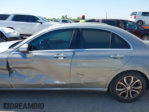 2015 Mercedes-Benz C 300 with VIN 55SWF4JB0FU056349, listed as a IAAI auction lot 41957561 with 74,764 mi miles and . Bid and sale history available at carsss.com. Image 14.