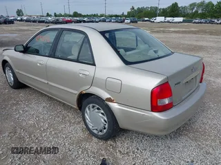 2001 Mazda Protege LX z VIN JM1BJ226210439446, wystawiony jako IAAI lot #42336976 z przebiegiem 155 990 mil mil oraz . Historia ofert i sprzedaży dostępna na DreamBid. Obrazek 3.