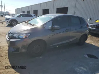2015 Honda Fit LX z VIN 3HGGK5H58FM751957, wystawiony jako Copart lot #66902445 z przebiegiem 174 276 mil mil oraz Czysty tytuł • Clean title. Historia ofert i sprzedaży dostępna na DreamBid. Obrazek 1.