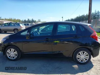 2015 Honda Fit LX with VIN 3HGGK5H58FM765907, listed as a IAAI auction lot 42061158 with 120,178 mi miles. Bid and sale history available at carsss.com. Image 15.
