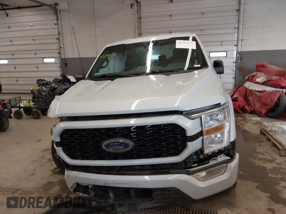 2021 Ford F-150 XL with VIN 1FTEW1CP9MKE41204, listed as a IAAI auction lot 42314231 with 59,959 mi miles and . Bid and sale history available at DreamBid. Image 13.
