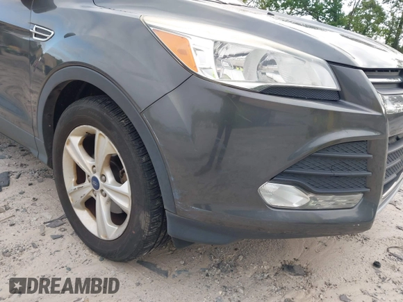 2016 Ford Escape SE with VIN 1FMCU0GX3GUC05279, listed as a IAAI auction lot 42142557 with 87,177 mi miles. Bid and sale history available at carsss.com. Image 6.