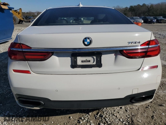 2016 BMW 7 Series 750i with VIN WBA7F0C56GGL99161, listed as a Copart auction lot 87652655 with 97,805 mi miles and Salvage Title. Bid and sale history available at carsss.com. Image 6.