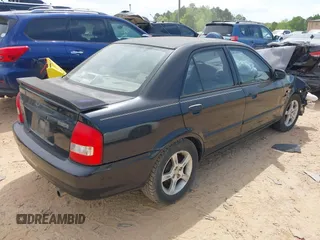 2003 Mazda Protege DX with VIN JM1BJ225630146692, listed as a IAAI auction lot 42017013 with 239,687 mi miles and . Bid and sale history available at DreamBid. Image 4.