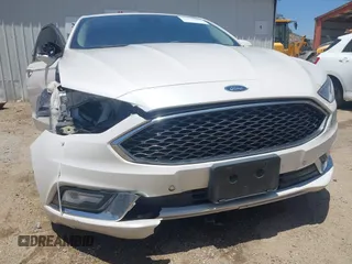 2017 Ford Fusion Titanium z VIN 3FA6P0SU0HR329224, wystawiony jako IAAI lot #42291605 z przebiegiem 176 728 mil mil oraz . Historia ofert i sprzedaży dostępna na DreamBid. Obrazek 12.