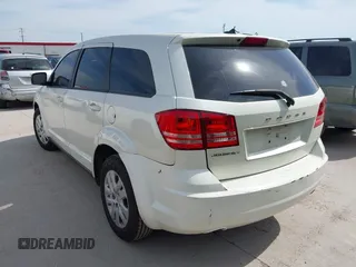 2013 Dodge Journey American Value with VIN 3C4PDCAB0DT723988, listed as a IAAI auction lot 42263191 with 205,014 mi miles and . Bid and sale history available at DreamBid. Image 3.