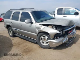 2001 GMC Yukon SLE z VIN 1GKEC13T81R199874, wystawiony jako IAAI lot #42174101 z przebiegiem Nie podano mil oraz . Historia ofert i sprzedaży dostępna na DreamBid. Obrazek 1.