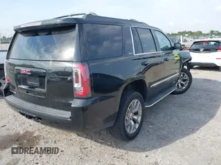 2015 GMC Yukon SLT with VIN 1GKS1BKC1FR539194, listed as a IAAI auction lot 41864424 with 1 mi miles. Bid and sale history available at carsss.com. Image 4.