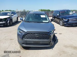 2023 Toyota Corolla Cross LE with VIN 7MUCAAAGXPV045651, listed as a IAAI auction lot 42006289 with 23,282 mi miles and . Bid and sale history available at DreamBid. Image 12.