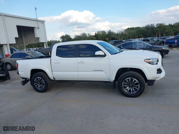 2023 Toyota Tacoma 4WD SR with VIN 3TMCZ5AN9PM566739, listed as a IAAI auction lot 41513763 with 16,708 mi miles. Bid and sale history available at carsss.com. Image 14.