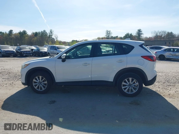 2015 Mazda CX-5 Sport with VIN JM3KE4BY3F0495511, listed as a IAAI auction lot 42170968 with 206,217 mi miles and . Bid and sale history available at carsss.com. Image 14.