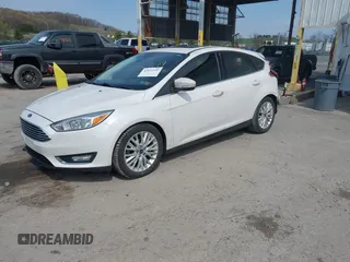 2017 Ford Focus Titanium with VIN 1FADP3N24HL331009, listed as a IAAI auction lot 42029193 with 82,068 mi miles and . Bid and sale history available at carsss.com. Image 17.