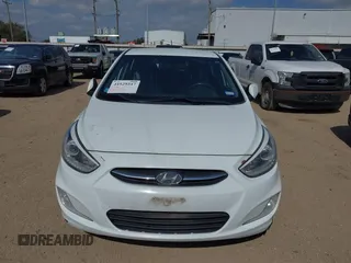 2015 Hyundai Accent Sport with VIN KMHCU5AE5FU201477, listed as a IAAI auction lot 41529347 with 189,774 mi miles. Bid and sale history available at carsss.com. Image 6.