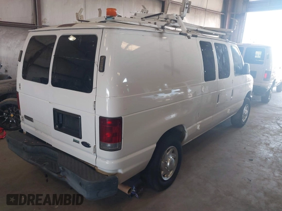 2010 Ford Econoline Cargo Commercial with VIN 1FTNE2EL7ADA74595, listed as a IAAI auction lot 42512878 with 154,412 mi miles and . Bid and sale history available at DreamBid. Image 4.