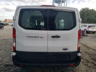 2021 Ford Transit Cargo with VIN 1FTBR1Y87MKA44540, listed as a Copart auction lot 74791034 with 128,242 mi miles and Salvage Title. Bid and sale history available at DreamBid. Image 6.