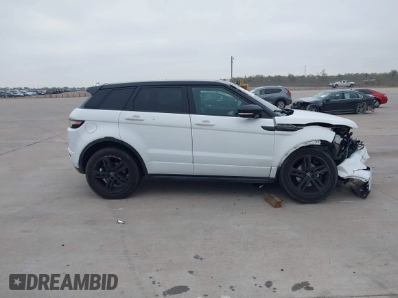 2013 Land Rover Range Rover Evoque Dynamic Premium z VIN SALVT2BG3DH741262, wystawiony jako IAAI lot #41059302 z przebiegiem Nie podano mil oraz . Historia ofert i sprzedaży dostępna na DreamBid. Obrazek 13.