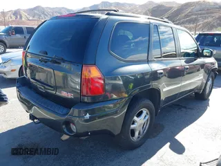2006 GMC Envoy SLT with VIN 1GKDS13S962184712, listed as a IAAI auction lot 41250740 with 226,986 mi miles. Bid and sale history available at carsss.com. Image 4.