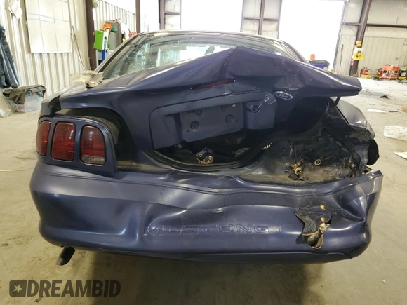 1996 Ford Mustang z VIN 1FALP4047TF185562, wystawiony jako Copart lot #55995745 z przebiegiem 154 906 mil mil oraz Szkoda całkowita • Salvage title. Historia ofert i sprzedaży dostępna na DreamBid. Obrazek 6.
