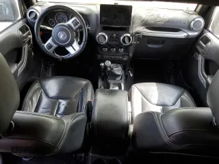 2015 Jeep Wrangler Unlimited Rubicon Hard Rock z VIN 1C4HJWFG5FL706170, wystawiony jako Copart lot #55442965 z przebiegiem Nie podano mil oraz Czysty tytuł • Clean title. Historia ofert i sprzedaży dostępna na DreamBid. Obrazek 8.