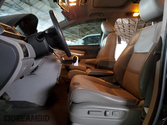 2012 Honda Odyssey Touring with VIN 5FNRL5H94CB026539, listed as a Copart auction lot 48925605 with 88,381 mi miles and Salvage Title. Bid and sale history available at DreamBid. Image 7.