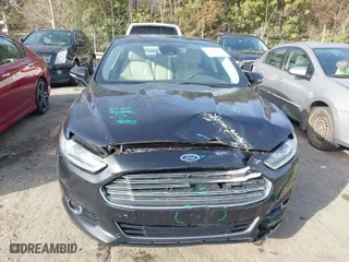 2015 Ford Fusion Energi Titanium with VIN 3FA6P0SU8FR189159, listed as a IAAI auction lot 41595744 with 170,558 mi miles. Bid and sale history available at carsss.com. Image 12.