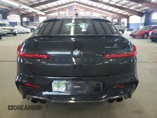 2020 BMW X4 M z VIN 5YMUJ0C06LLA99799, wystawiony jako Copart lot #65583704 z przebiegiem 32 033 mil mil oraz Szkoda całkowita • Salvage title. Historia ofert i sprzedaży dostępna na DreamBid. Obrazek 6.