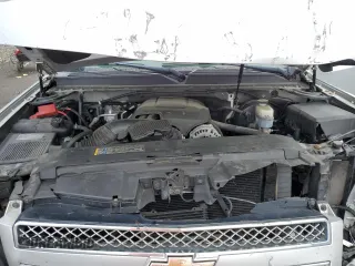 2010 Chevrolet Tahoe LTZ with VIN 1GNUKCE07AR223100, listed as a Copart auction lot 57439685 with 149,383 mi miles and Salvage title. Bid and sale history available at DreamBid. Image 12.