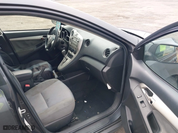 2009 Toyota Matrix S with VIN 2T1LE40E99C004133, listed as a IAAI auction lot 41917906 with 213,996 mi miles. Bid and sale history available at carsss.com. Image 5.