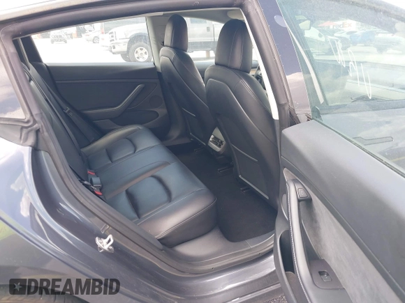 2023 Tesla Model 3 z VIN 5YJ3E1EA3PF435158, wystawiony jako IAAI lot #42356031 z przebiegiem 41 408 mil mil oraz . Historia ofert i sprzedaży dostępna na DreamBid. Obrazek 8.