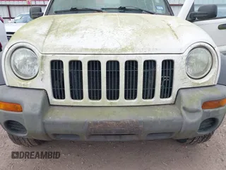 2003 Jeep Liberty Sport with VIN 1J4GK48KX3W536830, listed as a IAAI auction lot 41954874 with 128,757 mi miles and . Bid and sale history available at DreamBid. Image 6.