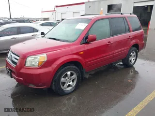 2006 Honda Pilot EX-L with VIN 2HKYF18576H516830, listed as a IAAI auction lot 41740470 with 202,179 mi miles. Bid and sale history available at carsss.com. Image 2.