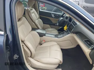 2017 Lincoln Continental Premiere with VIN 1LN6L9PK8H5623700, listed as a IAAI auction lot 41704381 with 138,787 mi miles. Bid and sale history available at carsss.com. Image 5.