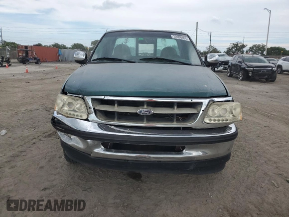 1998 Ford F-150 XL with VIN 1FTRF17L0WNA48153, listed as a Copart auction lot 72606904 with 213,592 mi miles and Non repairable. Bid and sale history available at DreamBid. Image 5.