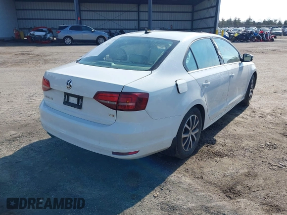 2017 Volkswagen Jetta SE with VIN 3VWDB7AJ7HM210497, listed as a IAAI auction lot 38571376 with 160,008 mi miles and . Bid and sale history available at DreamBid. Image 4.