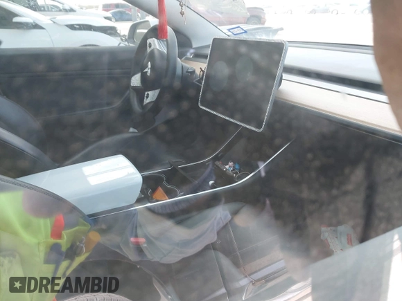 2019 Tesla Model 3 Mid Range with VIN 5YJ3E1EA6KF464615, listed as a IAAI auction lot 41306600 with 79,478 mi miles and . Bid and sale history available at DreamBid. Image 5.