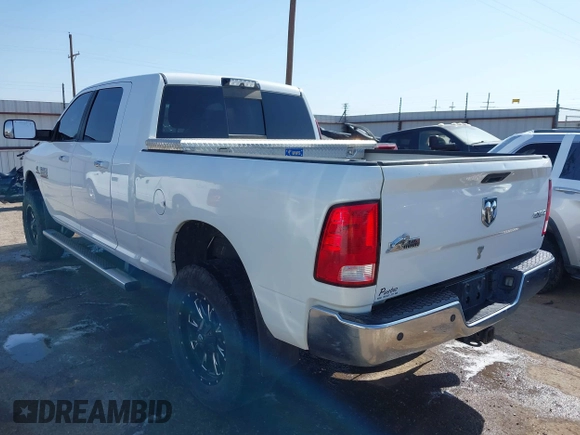 2015 Ram 2500 SLT with VIN 3C6UR5ML3FG674244, listed as a IAAI auction lot 42550144 with 220,481 mi miles and . Bid and sale history available at DreamBid. Image 3.