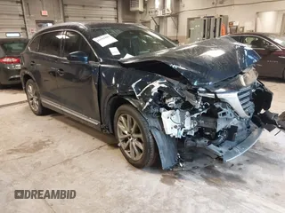 2018 Mazda CX-9 Grand Touring with VIN JM3TCBDY6J0216508, listed as a IAAI auction lot 41192901 with 60,366 mi miles and . Bid and sale history available at DreamBid. Image 1.