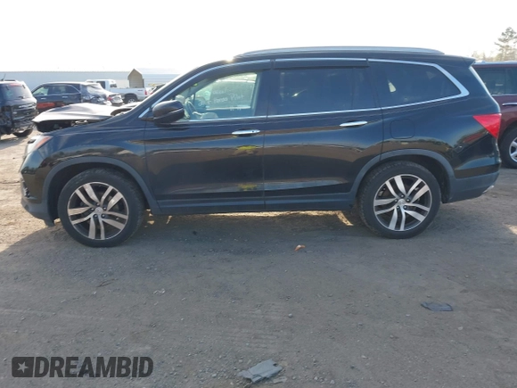 2017 Honda Pilot Touring with VIN 5FNYF6H9XHB062171, listed as a IAAI auction lot 41927969 with 210,633 mi miles. Bid and sale history available at carsss.com. Image 14.