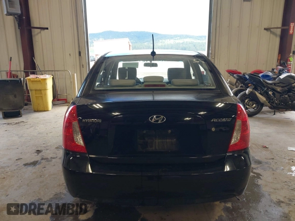 2011 Hyundai Accent GLS z VIN KMHCN4AC1BU620314, wystawiony jako IAAI lot #42228847 z przebiegiem 144 313 mil mil oraz . Historia ofert i sprzedaży dostępna na DreamBid. Obrazek 16.