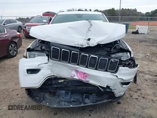 2018 Jeep Grand Cherokee Laredo E with VIN 1C4RJEAG7JC322888, listed as a IAAI auction lot 41756833 with 129,988 mi miles and . Bid and sale history available at DreamBid. Image 12.