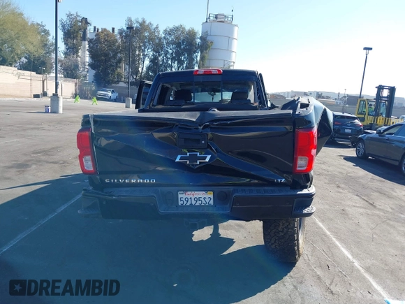 2018 Chevrolet Silverado 1500 LTZ with VIN 3GCUKSEC1JG560567, listed as a IAAI auction lot 41664625 with Not Provided miles and . Bid and sale history available at DreamBid. Image 15.