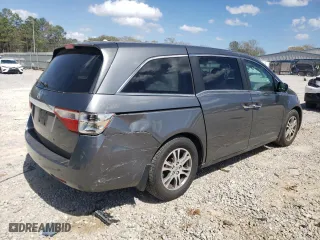 2012 Honda Odyssey EX-L with VIN 5FNRL5H68CB045200, listed as a Copart auction lot 49734055 with 123,577 mi miles and Salvage Title. Bid and sale history available at carsss.com. Image 3.