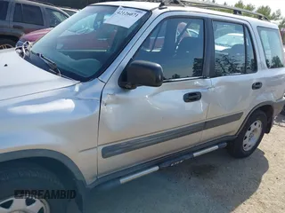 1999 Honda CR-V LX with VIN JHLRD1840XC057285, listed as a IAAI auction lot 42126071 with 99,000 mi miles. Bid and sale history available at carsss.com. Image 6.