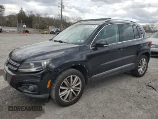 2012 Volkswagen Tiguan SE z VIN WVGBV7AXXCW593300, wystawiony jako Copart lot #51319715 z przebiegiem 121 518 mil mil oraz Czysty tytuł • Clean title. Historia ofert i sprzedaży dostępna na DreamBid. Obrazek 1.