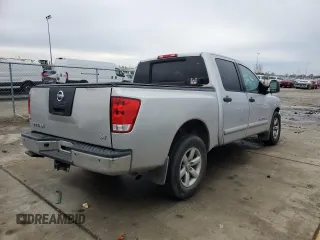 2011 Nissan Titan SL with VIN 1N6AA0ED2BN305628, listed as a Copart auction lot 85012324 with 188,329 mi miles and Salvage Title. Bid and sale history available at carsss.com. Image 3.